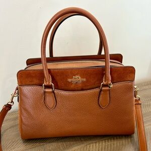 Coach pebbles leather and suede handbag.